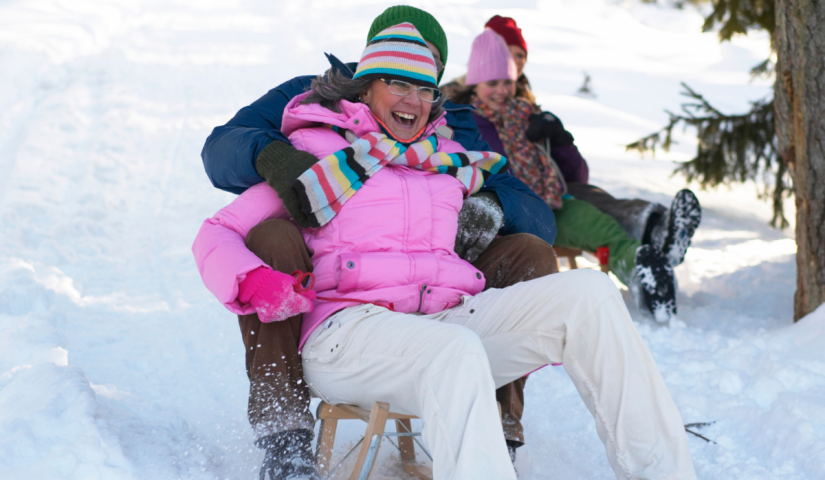 Winter Hearing Aid Tips for when out sledding with the family